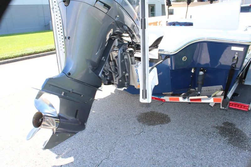 Slide: The Image of 2017 Pathfinder 2500 Hybrid boat with outboard motor on trailer. - 15