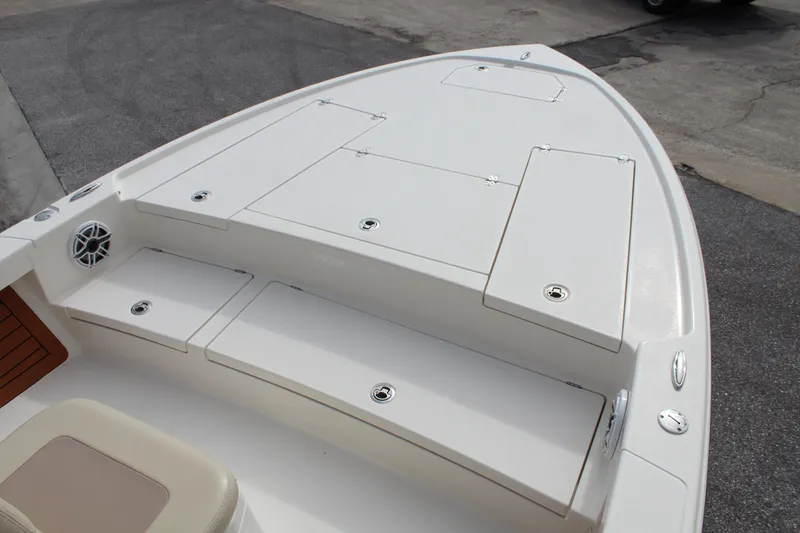 Slide: The Image of 2017 Pathfinder 2500 Hybrid boat deck with storage compartments and seating. - 33
