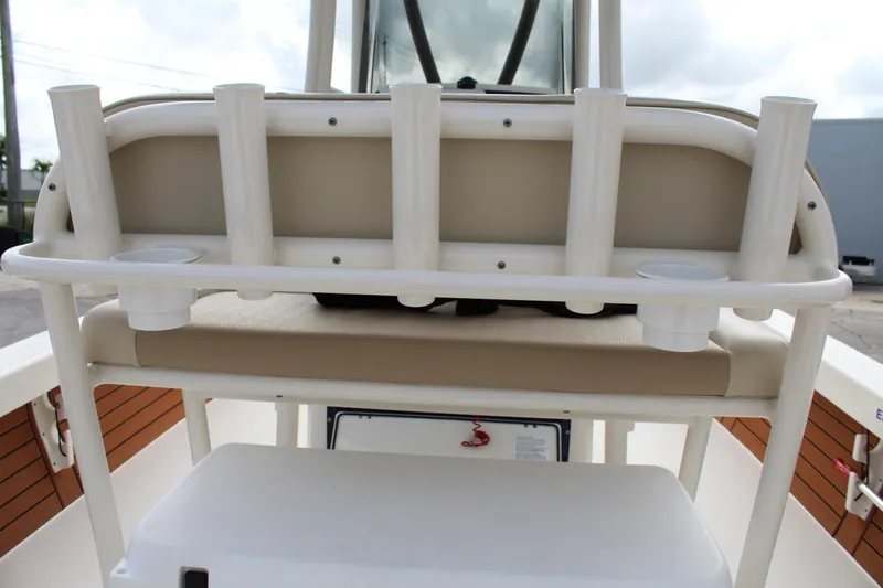 Slide: The Image of Pathfinder 2500 Hybrid 2017 boat seating with rod holders and storage. - 39