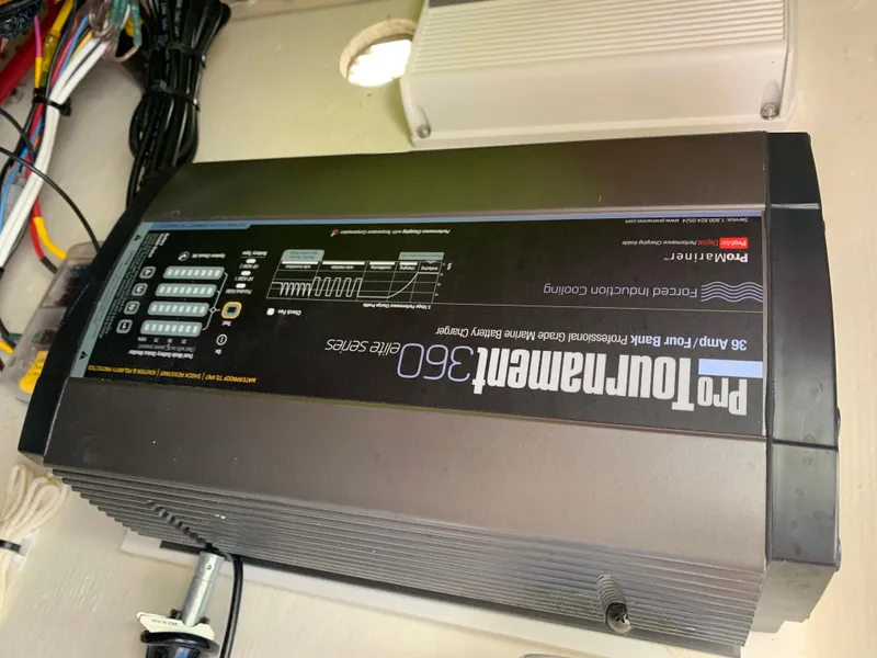 Slide: The Image of Pro Tournament 360 Elite Series battery charger in a 2017 Pathfinder 2500 Hybrid boat. - 48