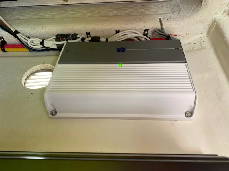 Slide: The Image of 2017 Pathfinder 2500 Hybrid electrical component with wiring and green indicator light. - 49