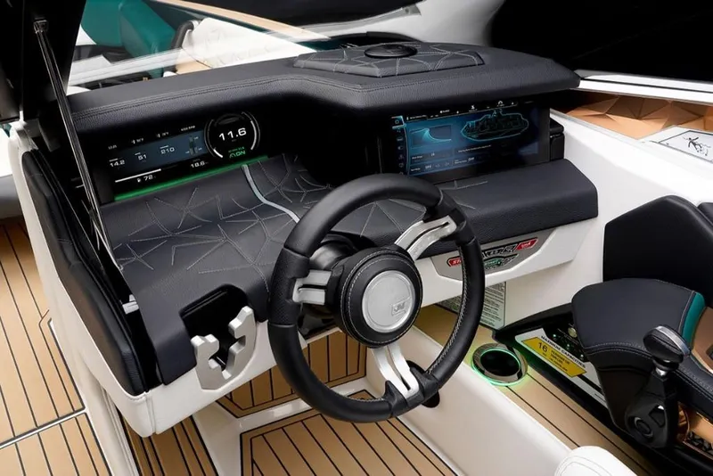 Slide: The Image of 2023 Nautique Super Air Nautique G23 Paragon dashboard with advanced controls and touchscreen displays. - 10