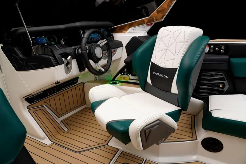 Slide: The Image of 2023 Nautique Super Air Nautique G23 Paragon cockpit with luxurious seating and advanced controls. - 13