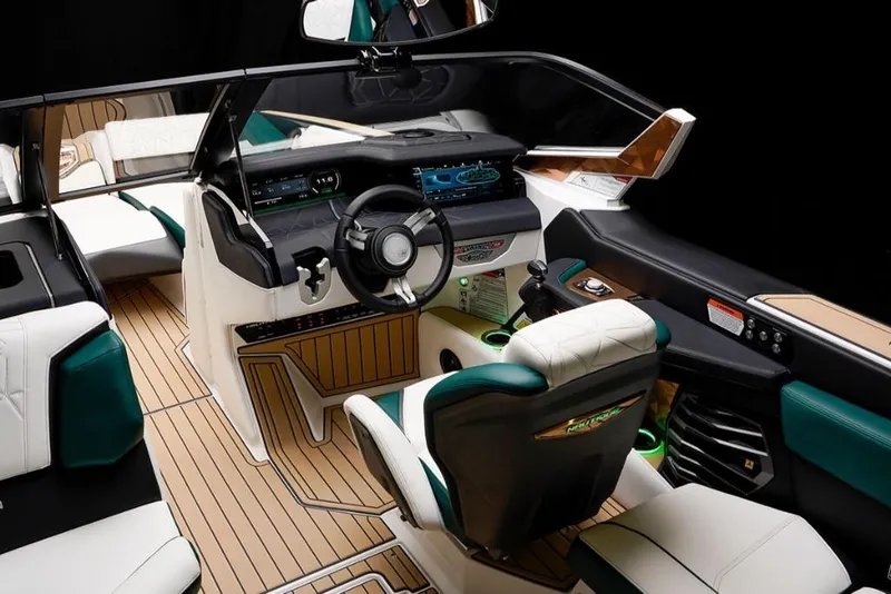 Slide: The Image of 2023 Nautique Super Air Nautique G23 Paragon cockpit with luxurious seating and advanced controls. - 15