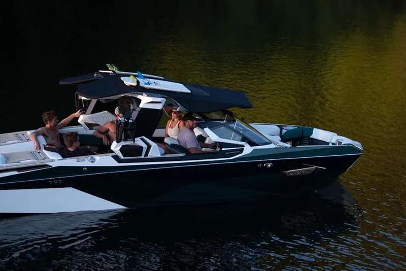 Slide: The Image of 2023 Nautique Super Air Nautique G23 Paragon on water with passengers. - 7