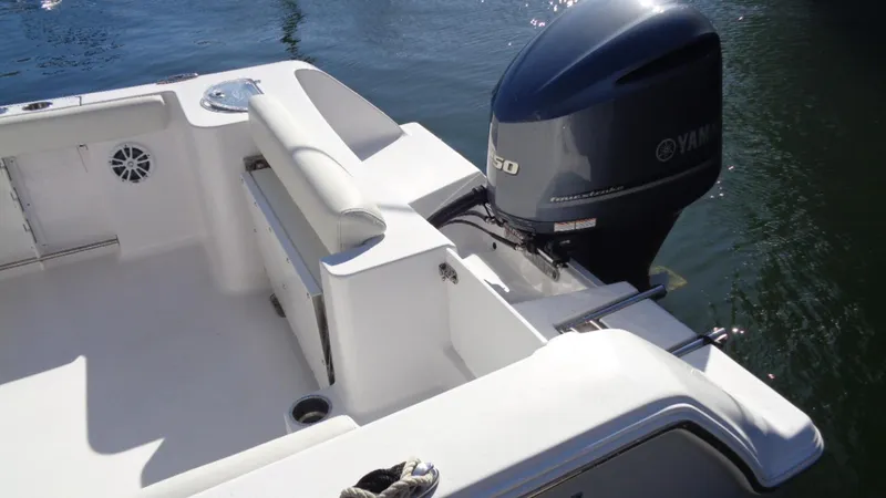 Slide: The Image of 2018 Sportsman 232 Open boat with Yamaha outboard motor on calm water. - 7