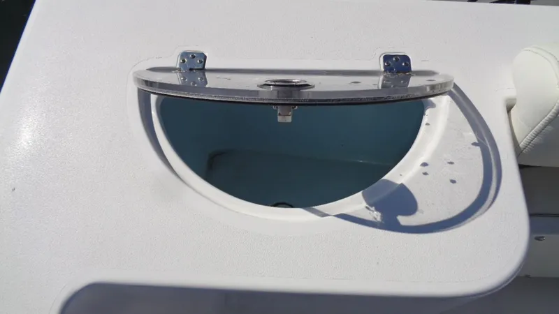 Slide: The Image of Open storage compartment on a 2018 Sportsman 232 Open boat. - 9