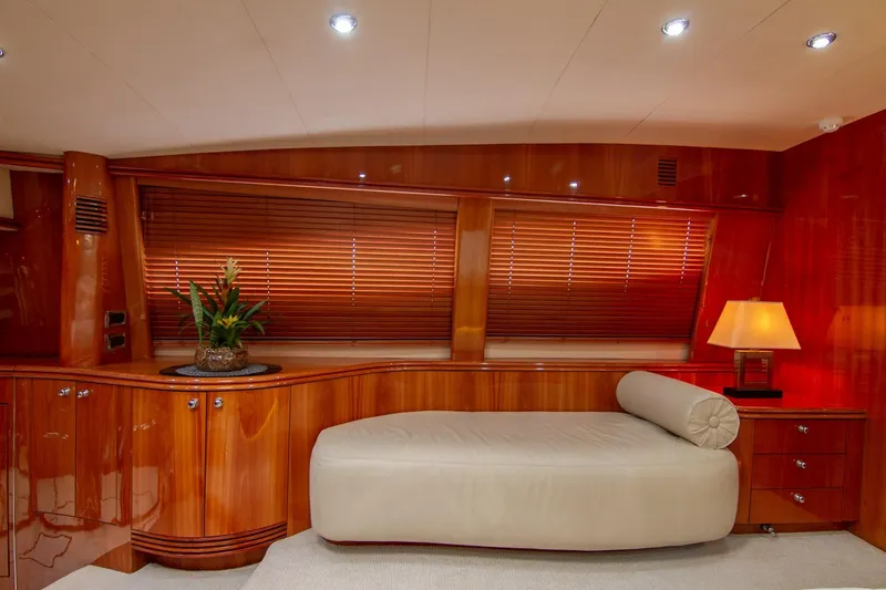 Slide: The Image of Luxurious interior of 2002 Sunseeker 105 Yacht with elegant wood paneling and modern furnishings. - 13