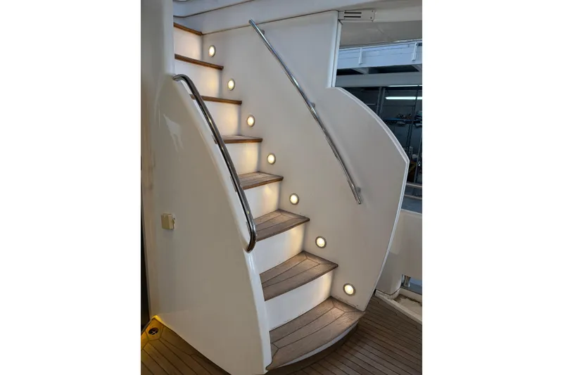 Slide: The Image of Staircase with ambient lighting on a 2002 Sunseeker 105 Yacht. - 25