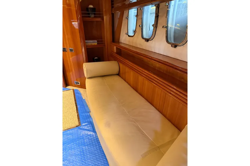 Slide: The Image of Luxurious interior of 2002 Sunseeker 105 Yacht with leather seating and wooden accents. - 39