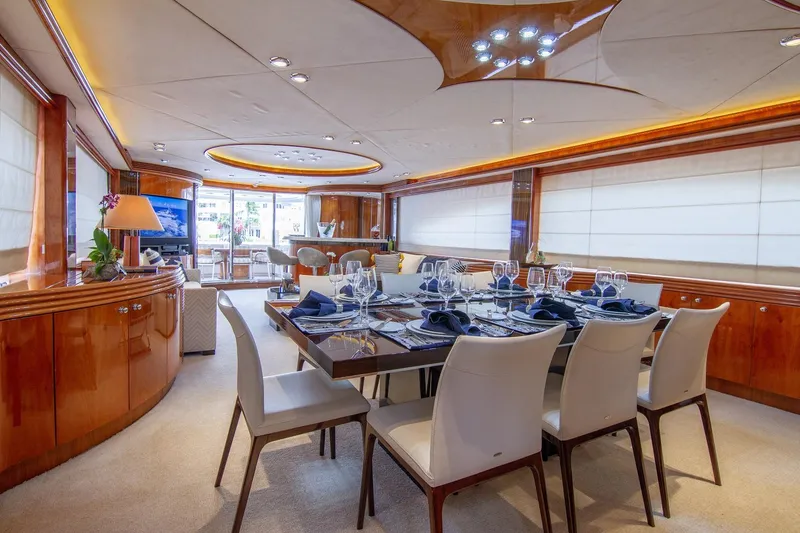Slide: The Image of Luxurious interior of a 2002 Sunseeker 105 Yacht with elegant dining area. - 4