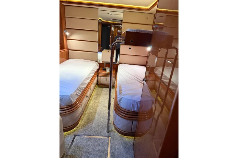 Slide: The Image of Luxurious twin cabin interior on a 2002 Sunseeker 105 Yacht. - 42