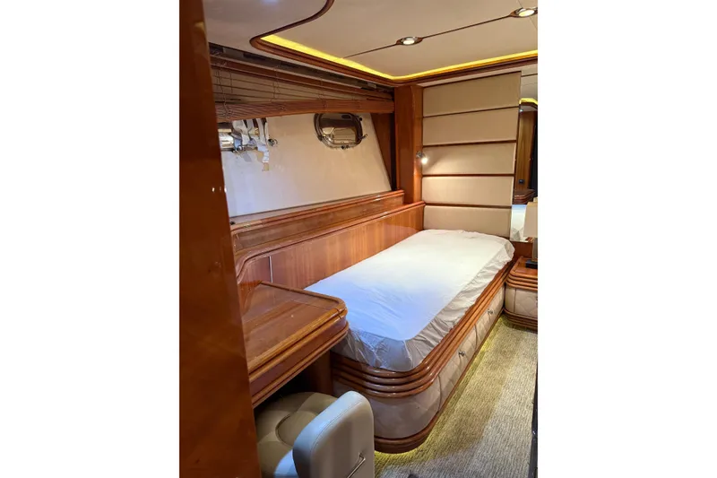 Slide: The Image of Luxurious cabin interior of 2002 Sunseeker 105 Yacht with elegant wood finishes. - 43