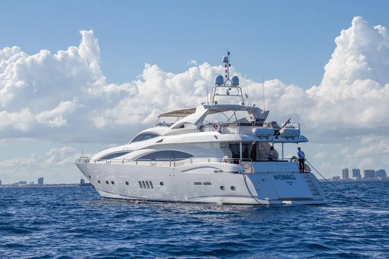 Slide: The Image of Luxurious 2002 Sunseeker 105 Yacht cruising on open sea under clear skies. - 5