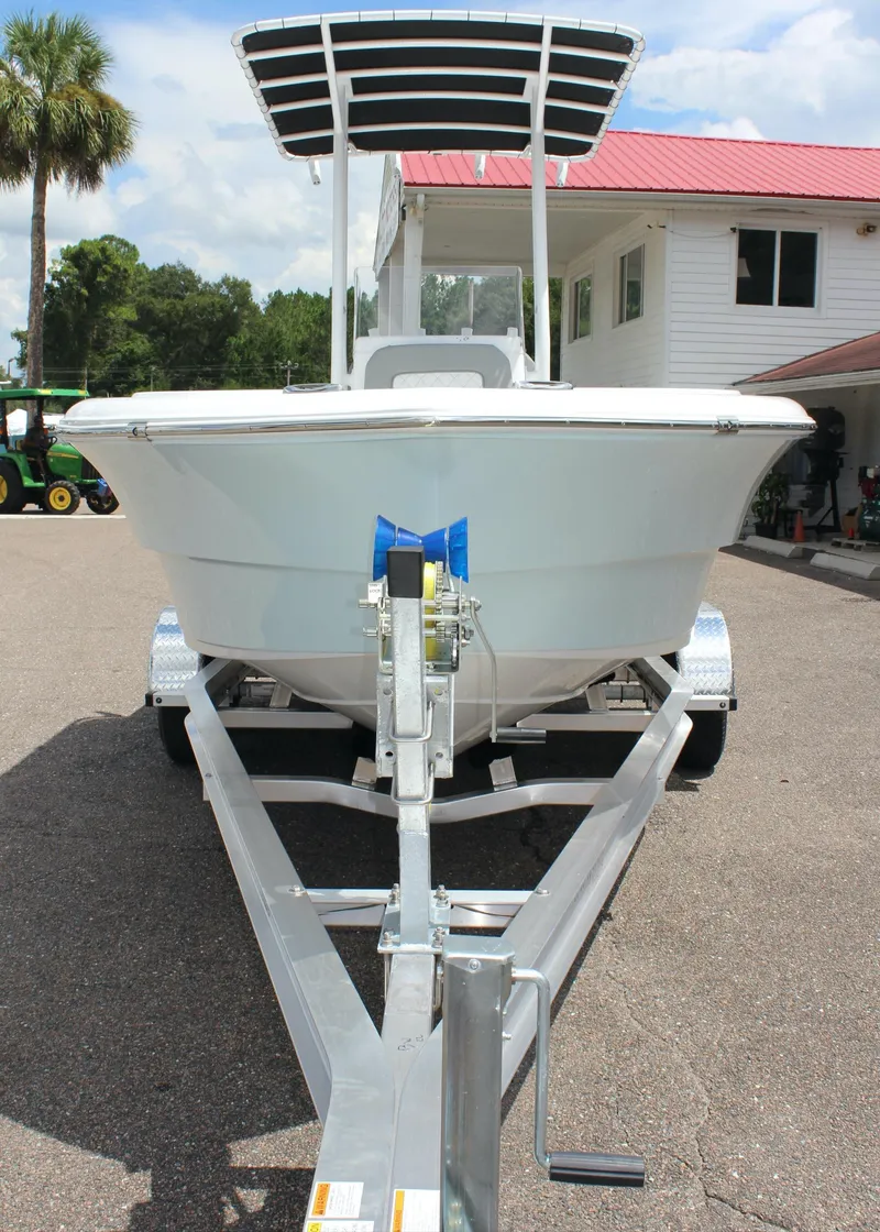 Slide: The Image of 2024 Clearwater 2000 CC boat on a trailer, front view. - 18
