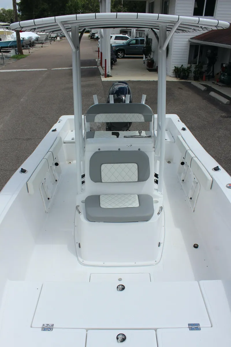 Slide: The Image of 2024 Clearwater 2000 CC center console boat with seating and T-top. - 20