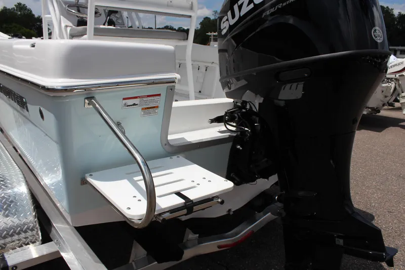 Slide: The Image of 2024 Clearwater 2000 CC boat with Suzuki outboard motor. - 6