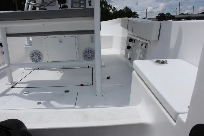 Slide: The Image of 2024 Clearwater 2000 CC boat interior with seating and storage compartments. - 8