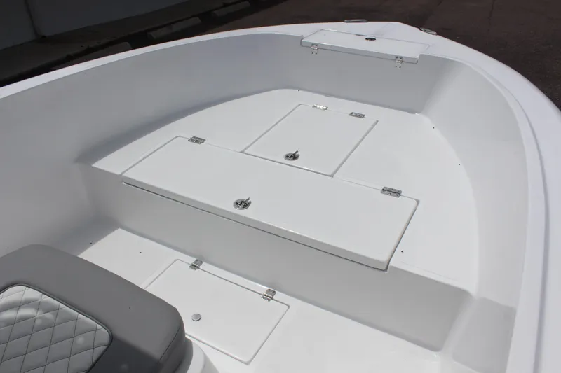 Slide: The Image of 2024 Clearwater 2000 CC boat interior with storage compartments. - 9