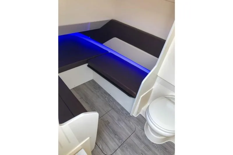 Slide: The Image of Interior cabin of 2023 Scout 330 LXF with seating and toilet. - 11