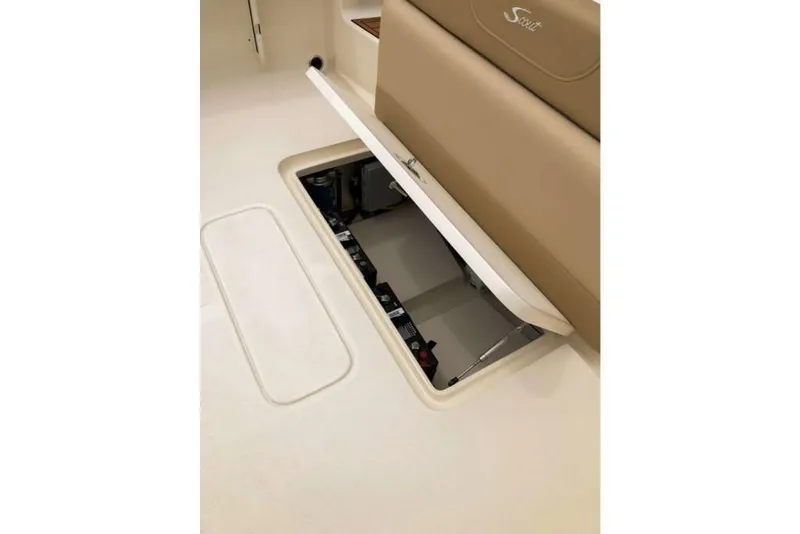 Slide: The Image of 2023 Scout 215 Dorado boat storage compartment with open hatch. - 19