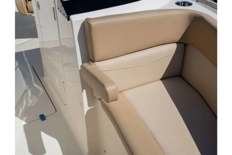 Slide: The Image of 2023 Scout 215 Dorado boat with beige leather seating. - 28