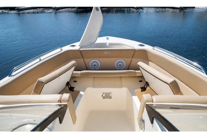 Slide: The Image of 2023 Scout 215 Dorado boat interior with tan seating and open bow. - 8