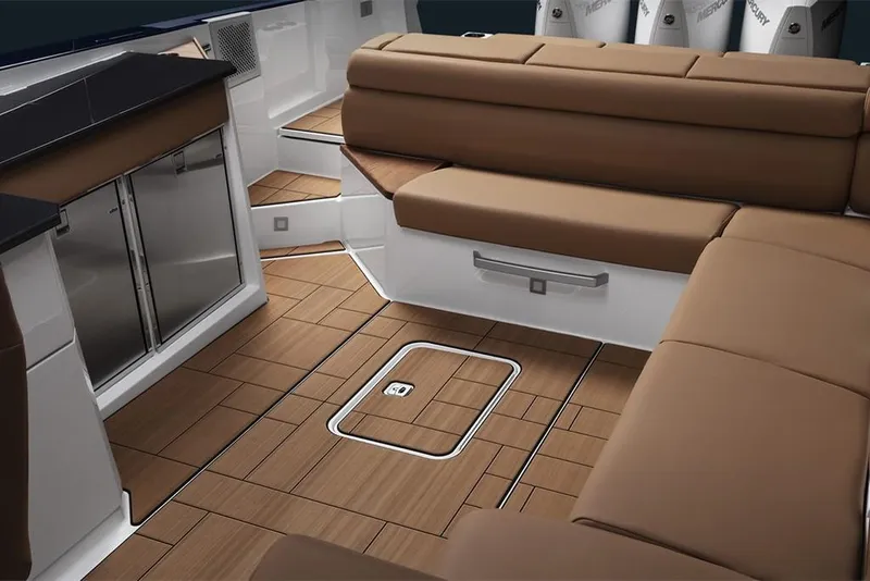 Slide: The Image of 2023 Aviara AV36 boat interior with brown leather seating and wooden flooring. - 16