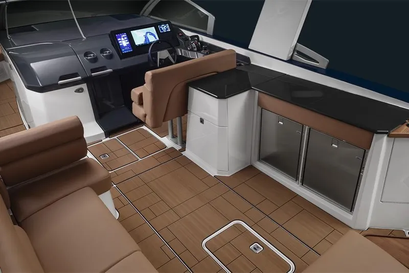 Slide: The Image of 2023 Aviara AV36 boat interior with modern helm, seating, and galley area. - 17