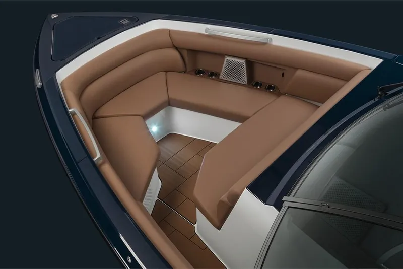 Slide: The Image of 2023 Aviara AV36 boat interior with luxurious brown seating and modern design. - 19
