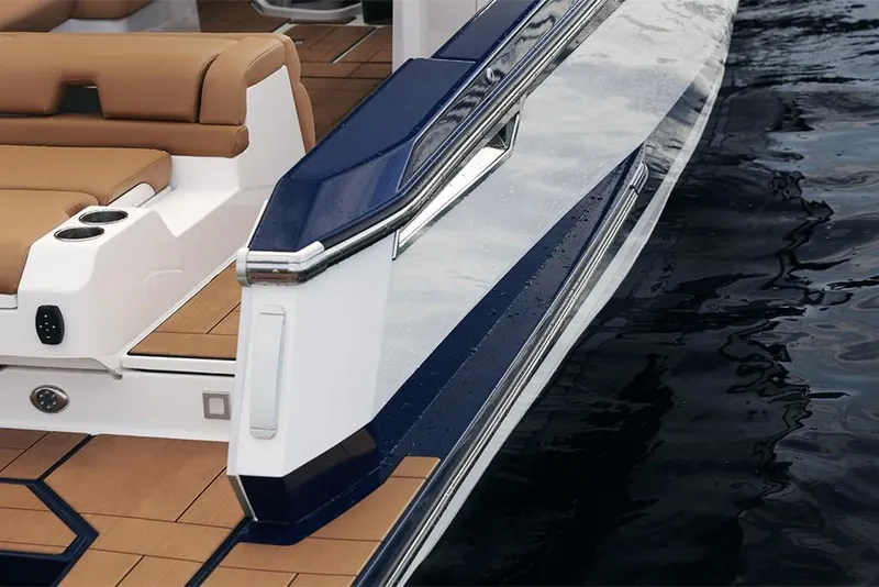 Slide: The Image of 2023 Aviara AV36 boat with luxurious seating and sleek design on the water. - 20