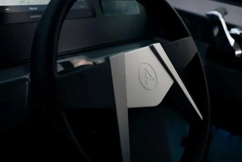 Slide: The Image of 2023 Aviara AV36 steering wheel and dashboard close-up. - 9
