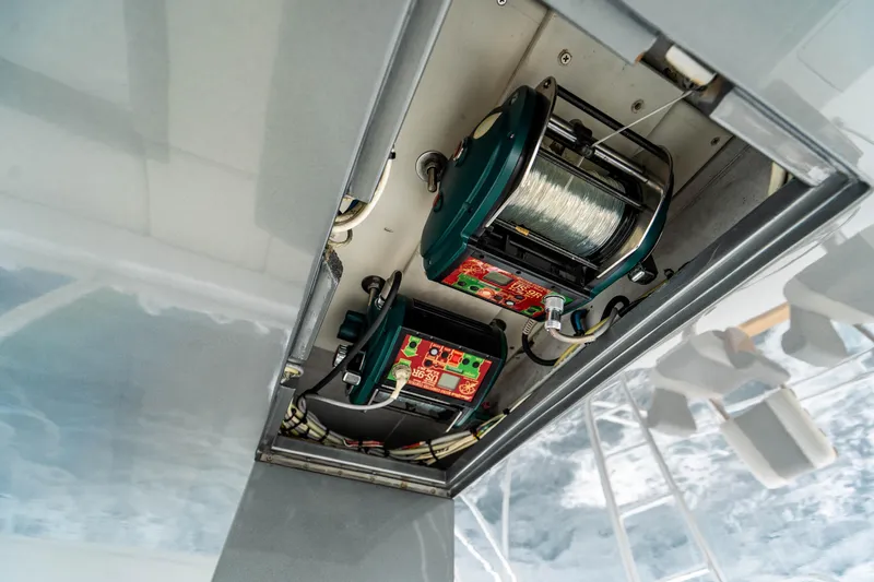Slide: The Image of Overhead view of fishing reels on a 1999 Jim Smith Custom 66 Sportfish boat. - 19