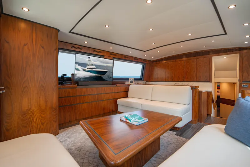 Slide: The Image of Luxurious interior of 1999 Jim Smith Custom 66 Sportfish yacht with elegant wood finishes. - 26