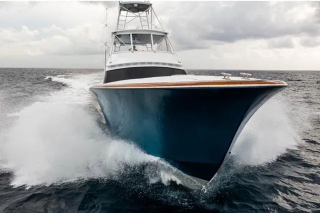Slide: The Image of Jim Smith Custom 66 Sportfish yacht cruising on open sea, 1999 model. - 3