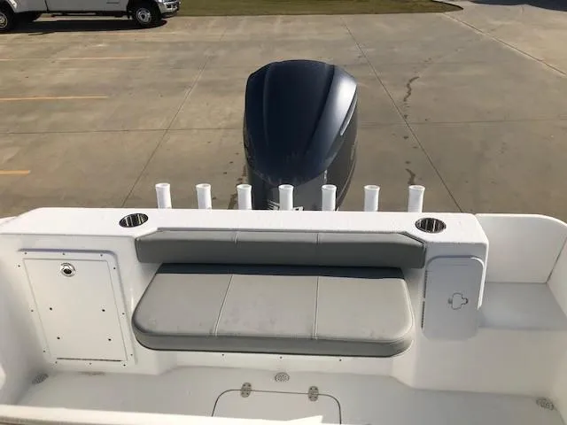 Slide: The Image of 2024 Cape Horn 22 boat with outboard motor and rear seating. - 11