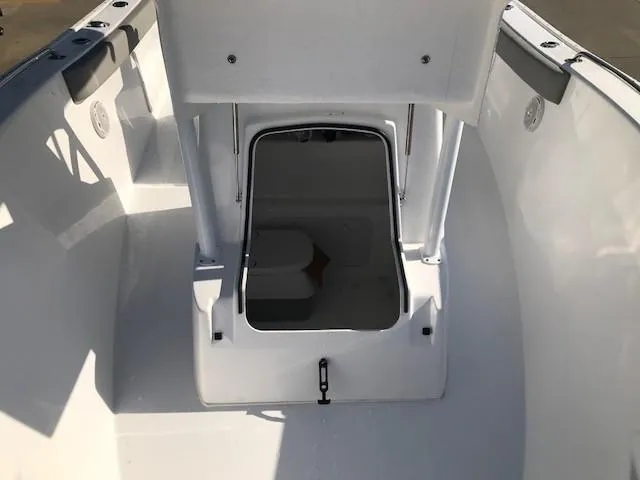 Slide: The Image of 2024 Cape Horn 22 boat interior with open storage compartment. - 8