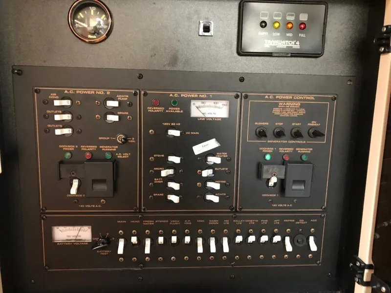 Slide: The Image of Control panel of a 2001 Cruisers Yachts 3470 Express boat. - 26