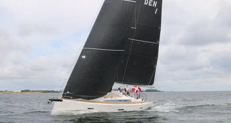 The Image of 2025 X-Yachts X4.3 sailing on open water with black sails. - 0