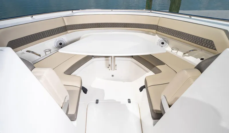 Slide: The Image of Spacious seating area on the 2025 Pursuit DC 326 boat. - 16