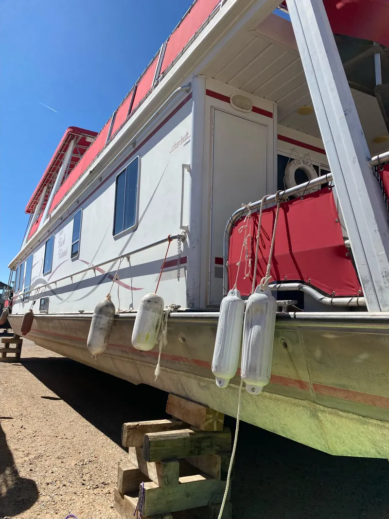 Slide: The Image of 2003 Stardust Cruisers Red Rock Retreat Week 26 houseboat on dry dock. - 1