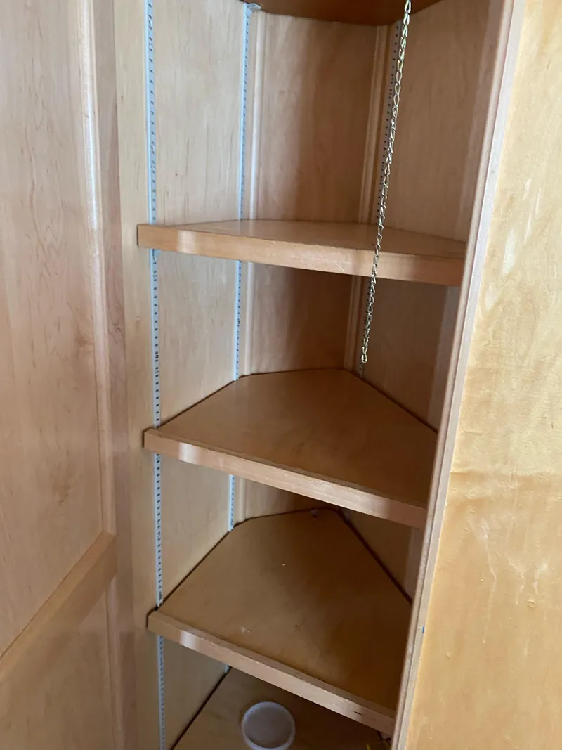 Slide: The Image of Wooden corner shelves in a 2003 Stardust Cruisers Red Rock Retreat Week 26. - 18