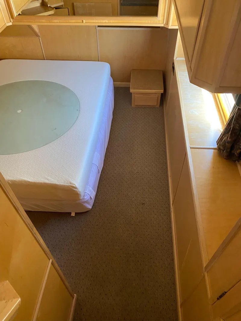 Slide: The Image of 2003 Stardust Cruisers Red Rock Retreat Week 26 bedroom with bed and nightstand. - 22