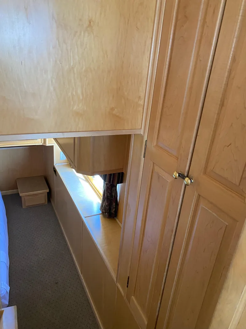 Slide: The Image of Interior of 2003 Stardust Cruisers Red Rock Retreat Week 26 houseboat with wooden cabinets. - 23