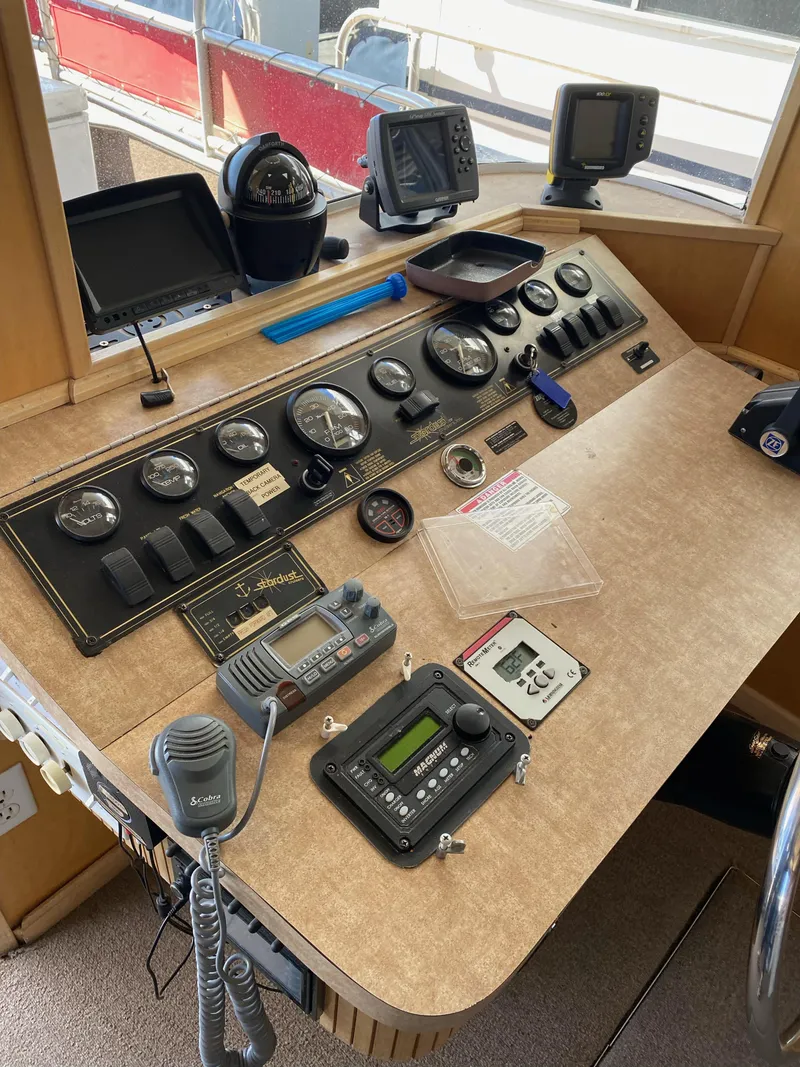 Slide: The Image of Control panel of a 2003 Stardust Cruisers Red Rock Retreat Week 26 houseboat. - 26