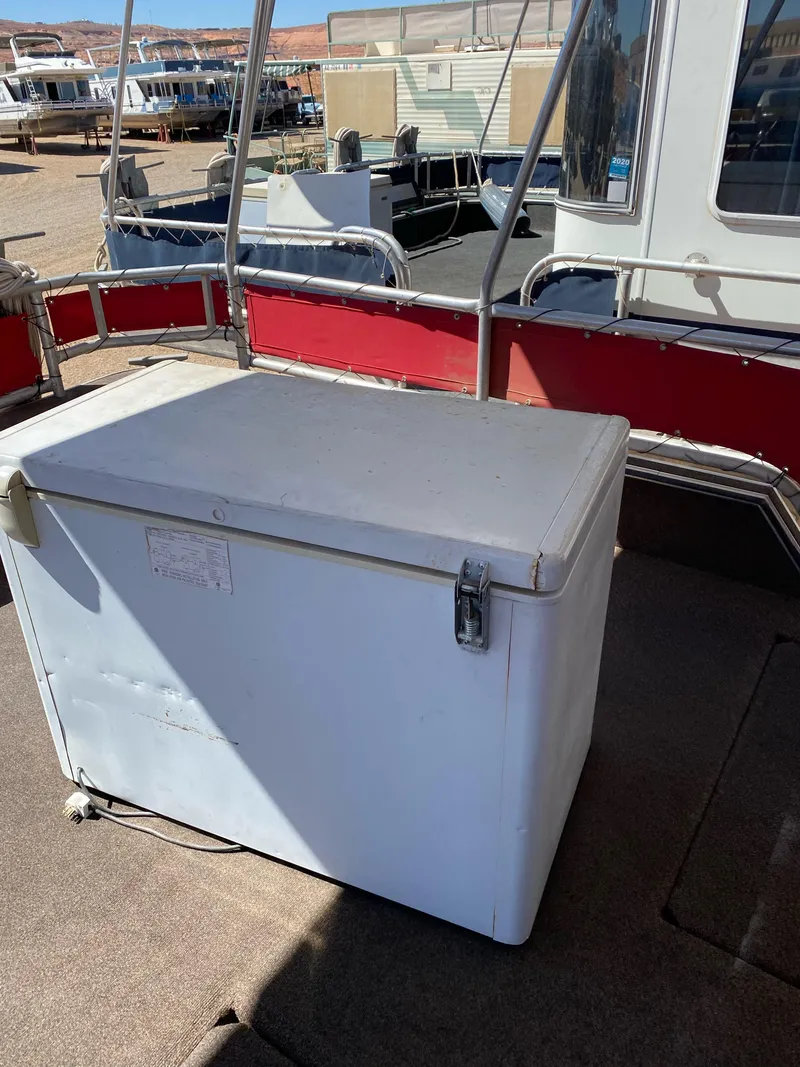 Slide: The Image of 2003 Stardust Cruisers Red Rock Retreat Week 26 houseboat deck with cooler. - 28