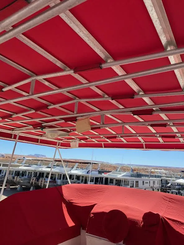 Slide: The Image of 2003 Stardust Cruisers Red Rock Retreat Week 26 houseboat with red canopy. - 33