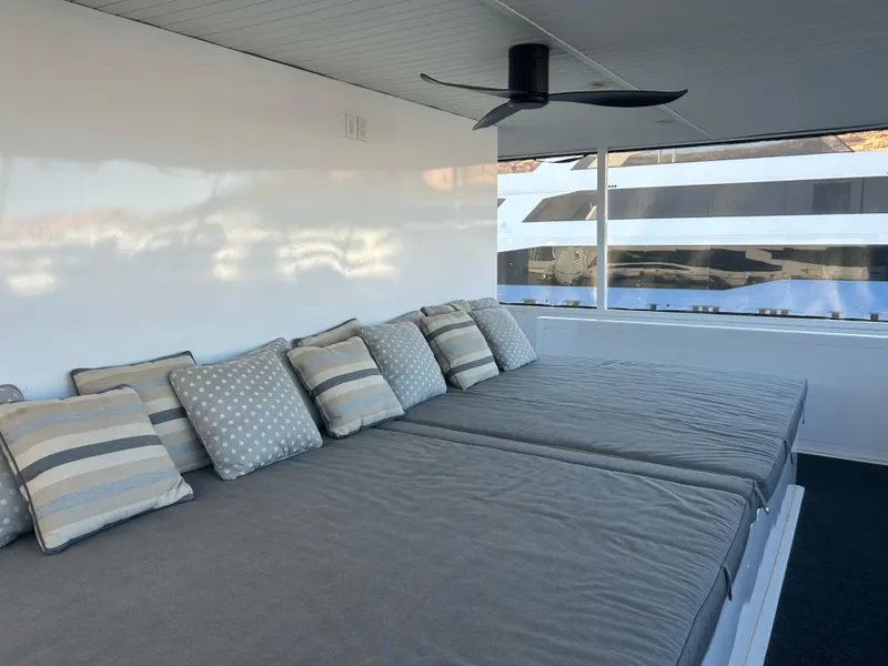 Slide: The Image of Luxurious Adonia Aquarius 2016 yacht interior with cozy seating and modern decor. - 12