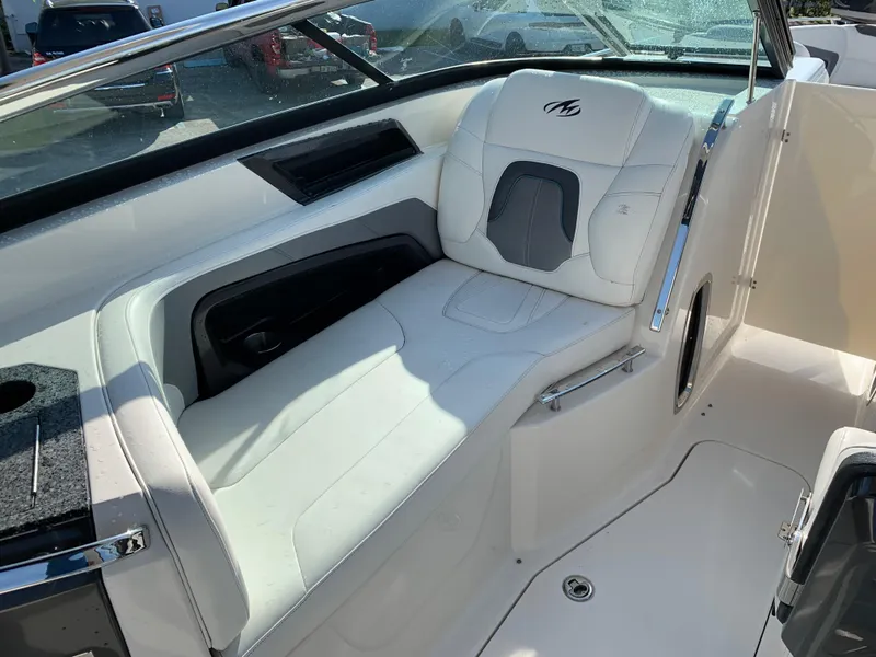 Slide: The Image of Luxurious seating in a 2012 Monterey 328 Super Sport boat. - 11