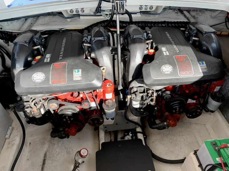 Slide: The Image of Twin engines of a 2012 Monterey 328 Super Sport boat. - 23